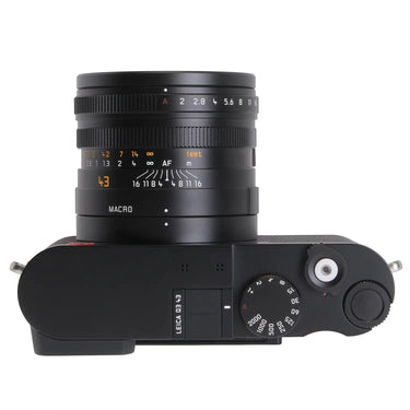 Camera West Leica Q3 43 digital camera top view showing lens aperture ring and shutter speed dial in black finish