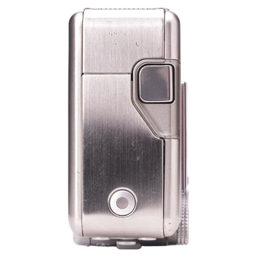 Canon PowerShot TX1 side panel showing fine surface scratches