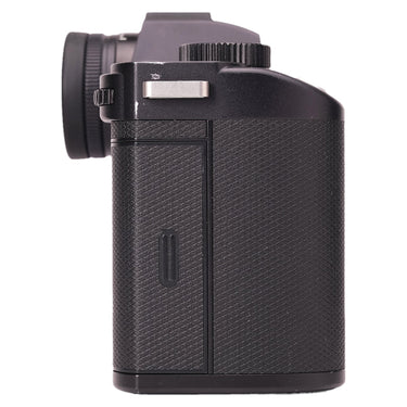 Leica SL2 left side view showing mounted body cap and grip