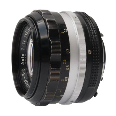 Nikon 50mm f1.4  Nikkor S.C. AI, lite haze 1300961