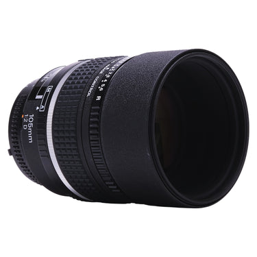 Nikon AF DC-Nikkor 105mm f2 D angled side view of barrel and focus ring