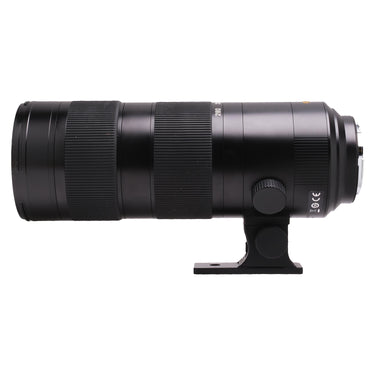 Leica 90-280mm SL lens laid on its side with tripod foot and focal length markings
