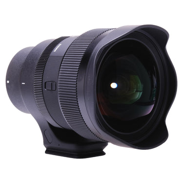 Sigma 14mm f1.4 DG DN Art front three-quarter view showing front glass and Sigma marking