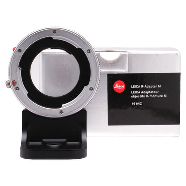 Leica R-Adapter M R-mount side next to original box labeled 14 642