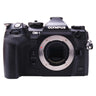 Olympus OM-1 front view with bare lens mount and exposed sensor