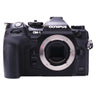 Olympus OM-1 front view with bare Micro Four Thirds mount and sensor exposed