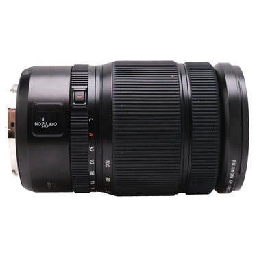 Fujifilm GF 45-100mm f4 side view with OIS switch and aperture ring