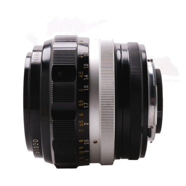 Nikon 85mm f1.8 Nikkor-H side view with engraved name and serial number