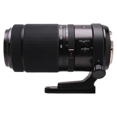 Fujifilm GF 100-200mm lens side view showing focus limiter and OIS switches