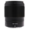 Nikon Z 35mm f1.8 S front three-quarter view showing 35/1.8 S label and A/M switch