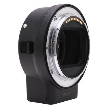 Nikon FTZ mount adapter F-mount lens side showing gold contacts and serial number