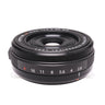 Fujifilm XF 27mm f2.8 R WR lens front angled view showing aperture ring and markings
