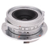 TTArtisan 28mm f5.6 silver front three-quarter view with aperture scale and focus ring