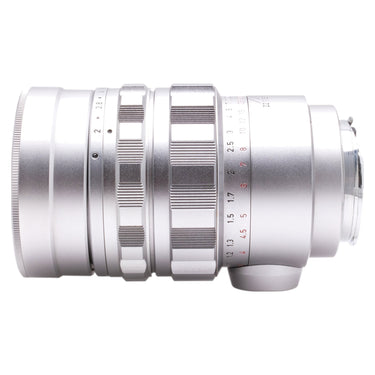 Leica 90mm f2 Summicron-M silver lens side profile with focus and aperture rings
