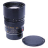 Leica 90mm f2 Summicron-M front element with extended hood and a separate Leitz front cap