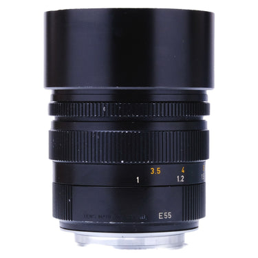 Leica 90mm f2 Summicron-M side view showing hood, focus and aperture rings, E55 and Made in Canada engraving