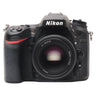 Nikon D7100 front view with AF 50mm f1.8 D lens mounted