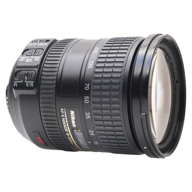 Nikon AF-S 18-200mm VR lens side view showing VR and focus mode switches