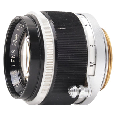 Canon 50mm f1.8 side profile showing 50mm engraving and focus lock screw