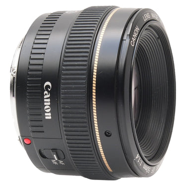 Canon EF 50mm f1.4 USM lens side view with focus ring and Canon logo