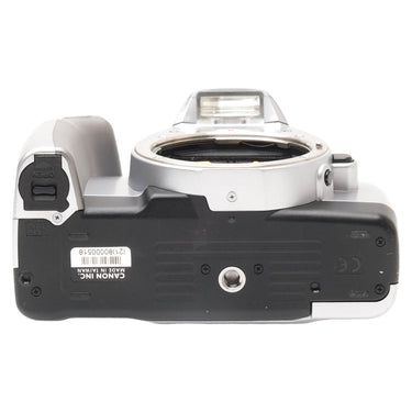 Canon EOS Rebel Ti bottom plate with serial label, tripod socket, and CR2 battery door