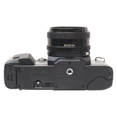 Canon T70 bottom plate showing body serial 2059959 and lens serial 8233256