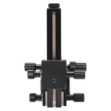 Canon FD Auto Bellows end view showing focusing rail, geared track, and adjustment knobs