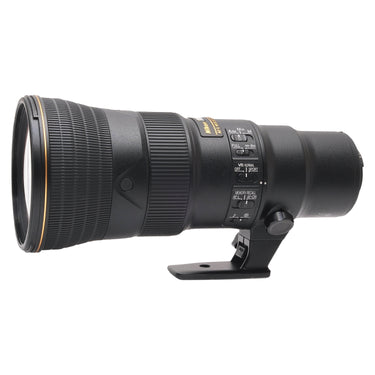 Nikon 500mm f5.6E PF side view showing focus, VR and memory recall switches