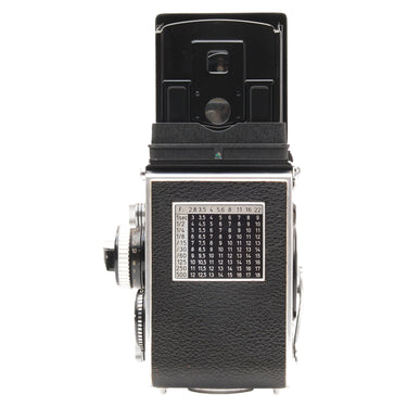 Rolleiflex 3.5F rear view with waist-level finder open and exposure table