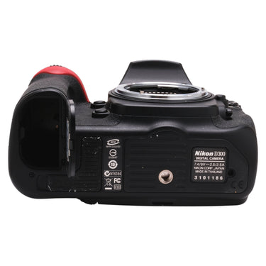 Nikon D300 bottom plate showing serial number and open battery door