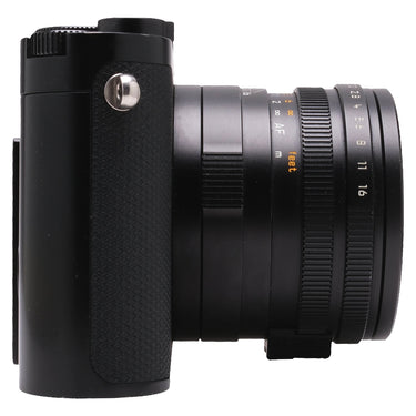 Leica Q3 left side showing grip, lens barrel and distance scale