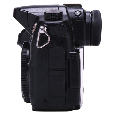 Panasonic Lumix GH4 left side showing microphone and headphone ports