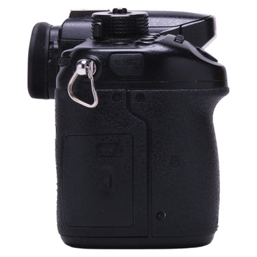 Panasonic Lumix GH4 right side showing SD card door and remote port
