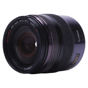 Panasonic Lumix G 12-35mm f2.8 angled front view with Lumix branding