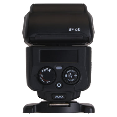 Leica SF 60 flash rear controls with mode dial, channel dial, and SF 60 label