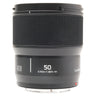 Panasonic Lumix S 50mm f1.8 lens standing upright with hood mounted and bare rear mount