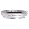 Leica M-Adapter L silver, angled view showing M bayonet mount and LEICA M-ADAPTER L engraving