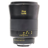 Zeiss Otus 55mm f1.4 standing upright, front view showing Otus 1.4/55 marking and lower mount