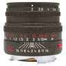 Leica Summicron-M 50mm f2 Safari front-quarter view, aperture and focus scales, red index and paint wear on olive barrel