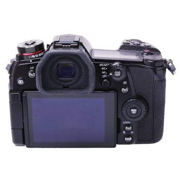 Panasonic Lumix DC-G9 rear view showing LCD screen, viewfinder eyecup and control buttons