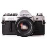 Canon AE-1 front view with Canon FD 50mm f1.8 lens mounted