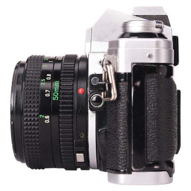 Canon AE-1 left side view with FD 50mm lens focus distance scale