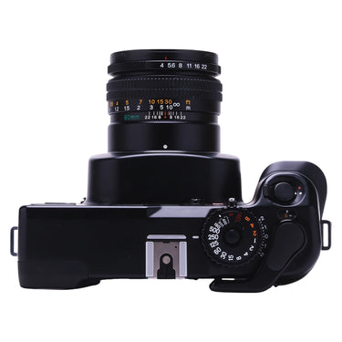 Mamiya 7II top plate showing shutter speed dial and lens aperture ring
