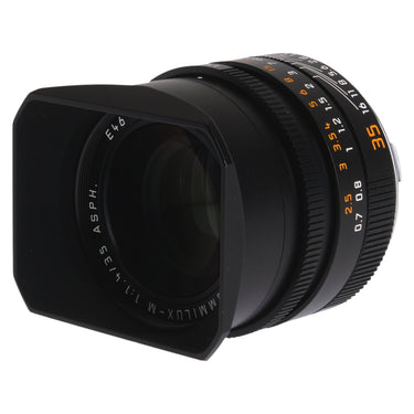 Leica Summilux-M 35mm f1.4 ASPH angled front view showing E46 filter thread and front element