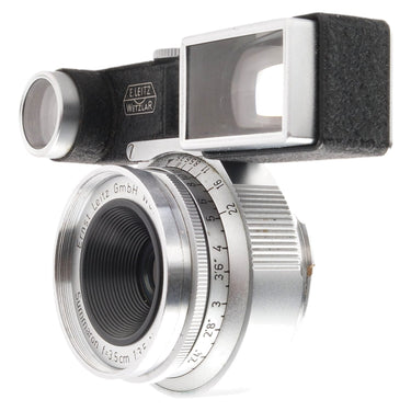 Leica 3.5cm f3.5 Summaron front three-quarter view showing distance and aperture scales with goggles