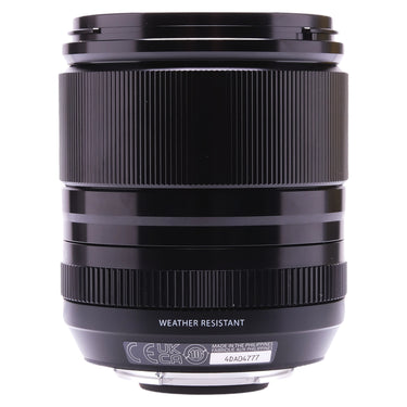 Fujifilm XF 23mm f1.4 lens side view showing serial number 4DA04777 and weather resistant marking