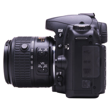 Nikon D80 with lens, right side showing VR switch and DC/USB ports
