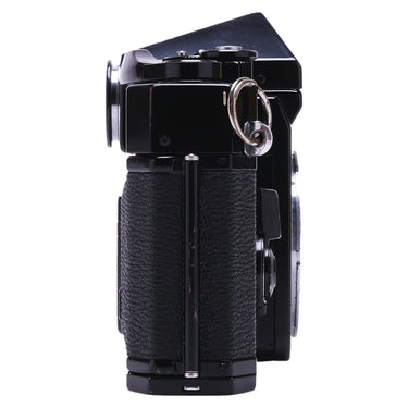 Canon F-1 left side view showing strap lug and prism