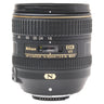 Nikon AF-S 16-80mm f2.8-4E ED VR DX lens front three-quarter view showing focal length scale and markings