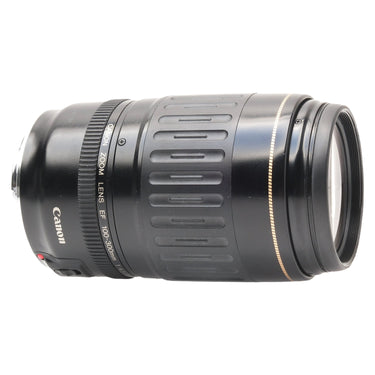 Canon EF 100-300mm side view with rear cap on the EF mount